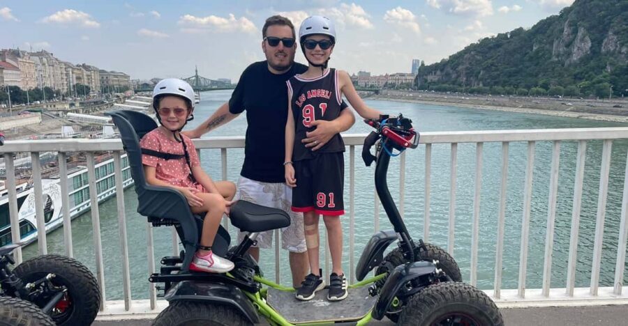 Budapest: Buda Highlights Guided Tour on Electric EZRaider - Crossing the Danube on Freedom Bridge: The Moment the City Opens Up