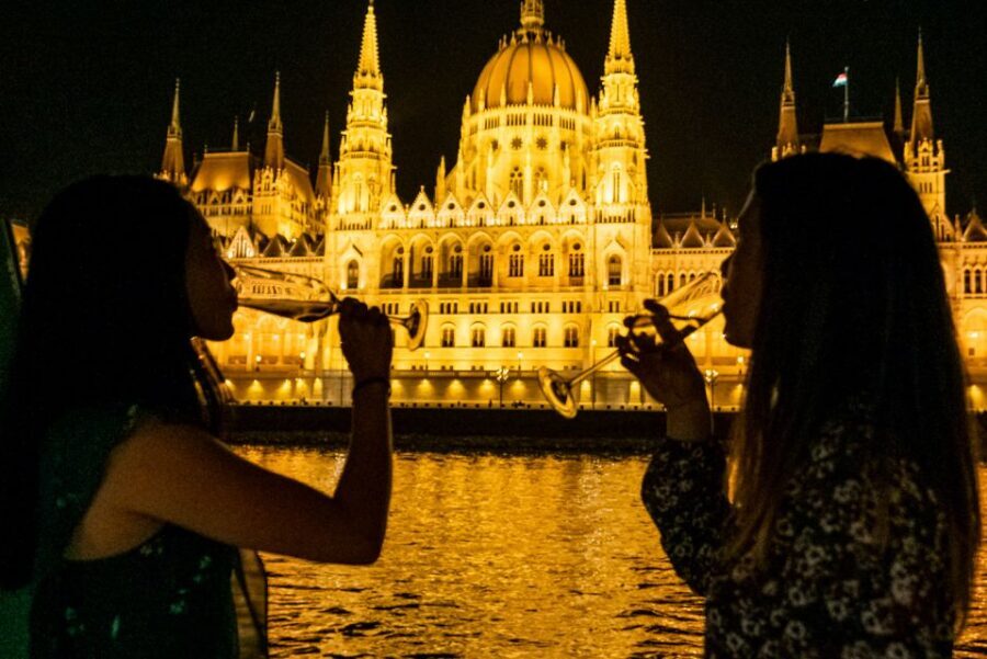 Budapest: Candlelit Dinner River Cruise with Live Music - Onboard setup: glass roof, photo windows, and table reality