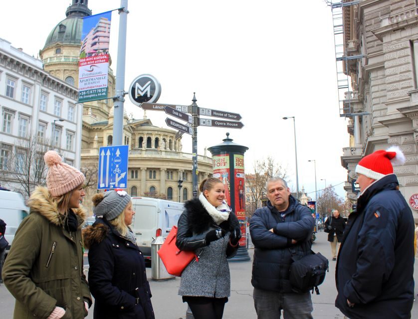Budapest Christmas Walking Tour w Entry to Basilica - City Hall Courtyard: Ice Rink Energy and the Charity Side of Christmas