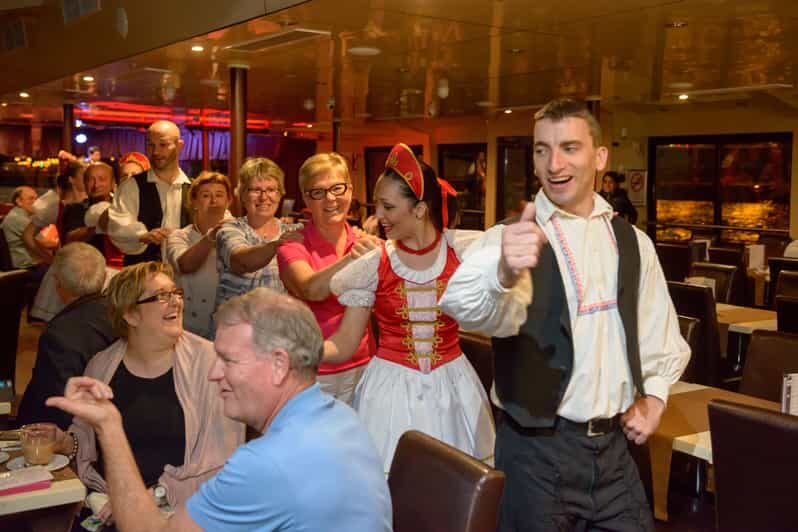 Budapest: Danube Cruise with Folk Dancing and Drinks - Parliament, Chain Bridge, and Castle Hill at night