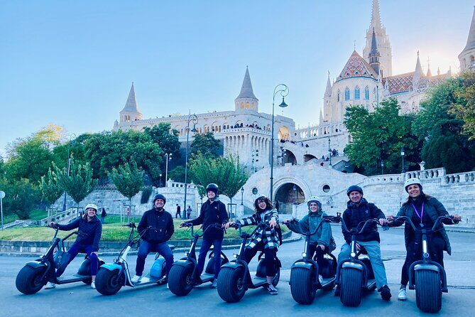 Budapest Small-Group Guided Tour on MonsteRoller e-Scooter - Stop 1: Parliament Building area views (no entry, lots of context)