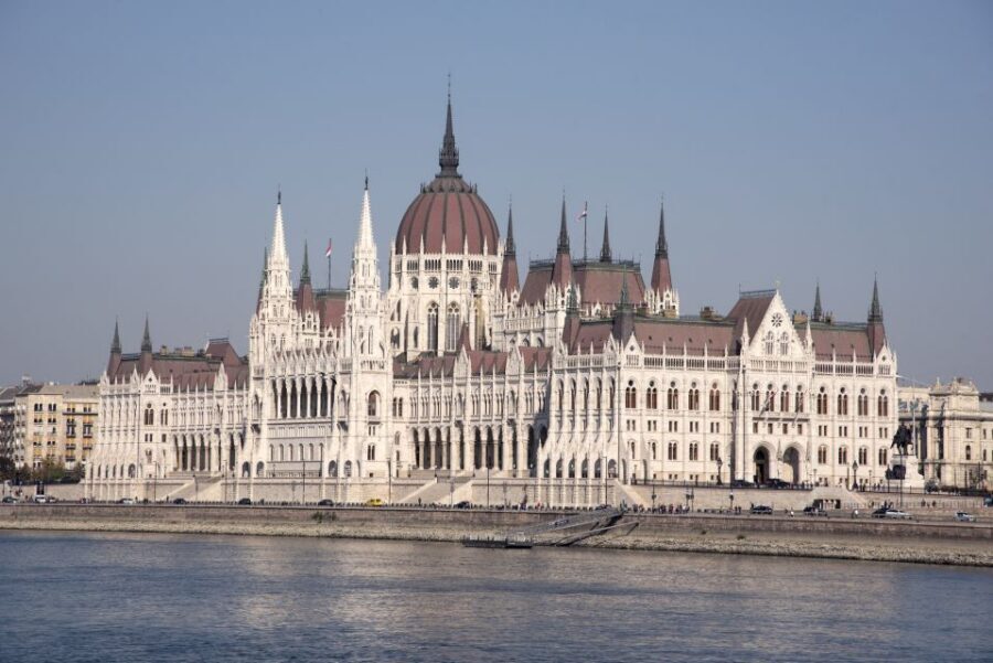Castle District & Pest Driving Tour with Danube River Cruise - Andrássy Avenue passes: Opera House and St Stephen’s Basilica