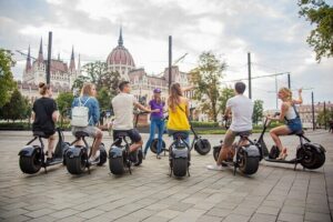 Guided Tours in Budapest on E-Scooter with various routes - Stop-by-stop: Parliament Building, Buda Castle views, and Matthias Church