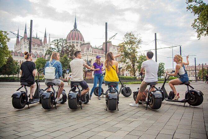 Guided Tours in Budapest on E-Scooter with various routes - Stop-by-stop: Parliament Building, Buda Castle views, and Matthias Church