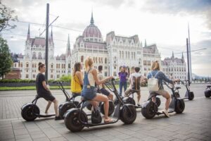 Top sights of Pest downtown on e-scooters incl. Parliament - Starting at E-Magine near Deák Ferenc tér (and why that matters)