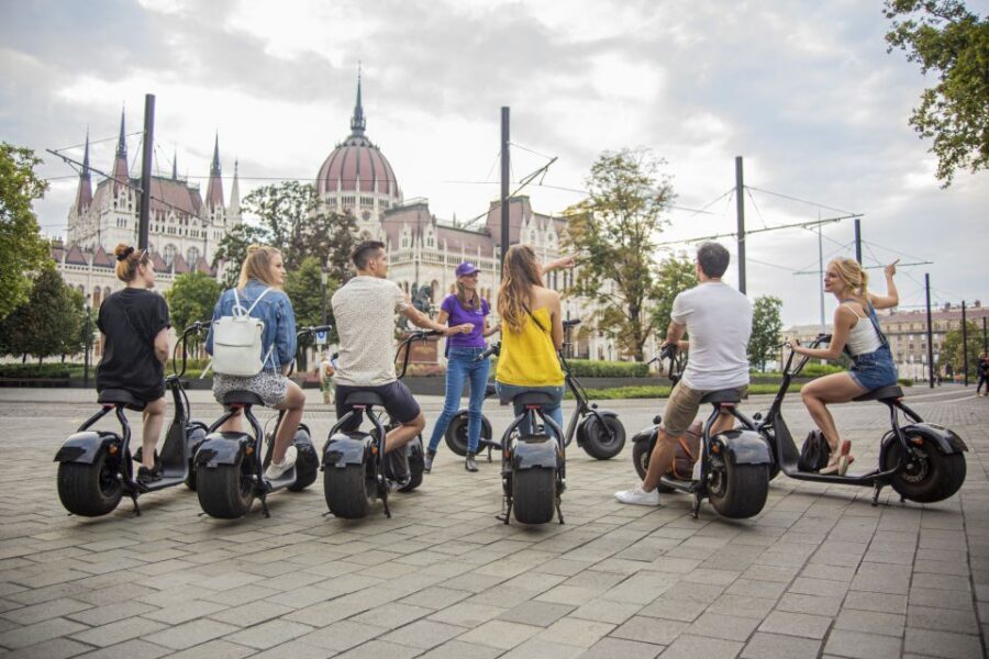 Top sights of Pest downtown on e-scooters incl. Parliament - Safety briefing and scooter training: you get confident fast
